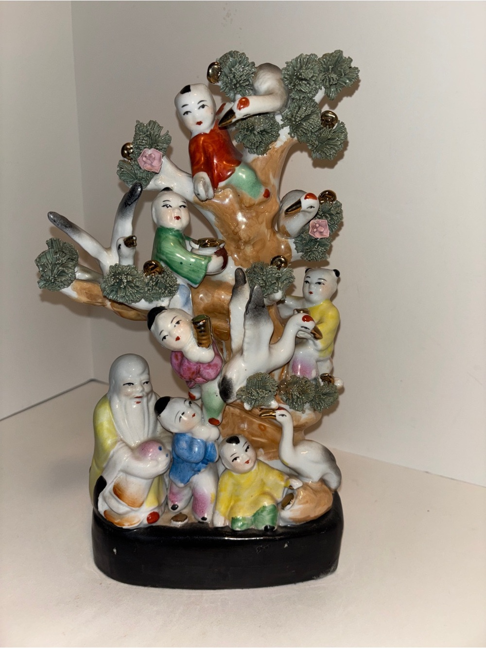 Hand-Painted Porcelain Figurine Tree with Children and Cranes - Multicolor